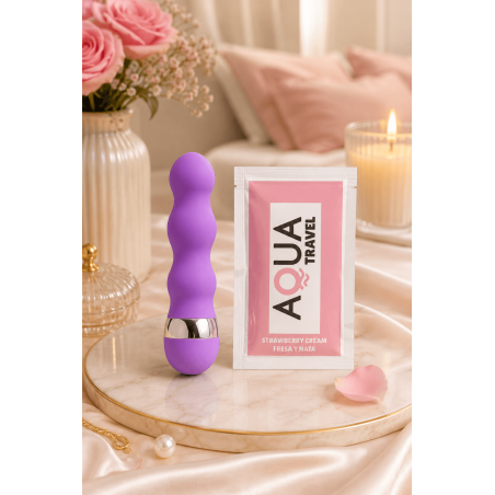 Mini Vibromasseur violet ondulés Pocket Pleasure  1 dosette de lubrifiant